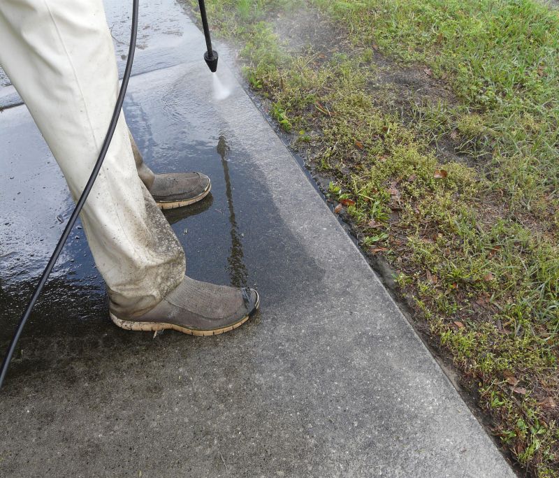 High-Pressure Cleaning of a Sidewalk